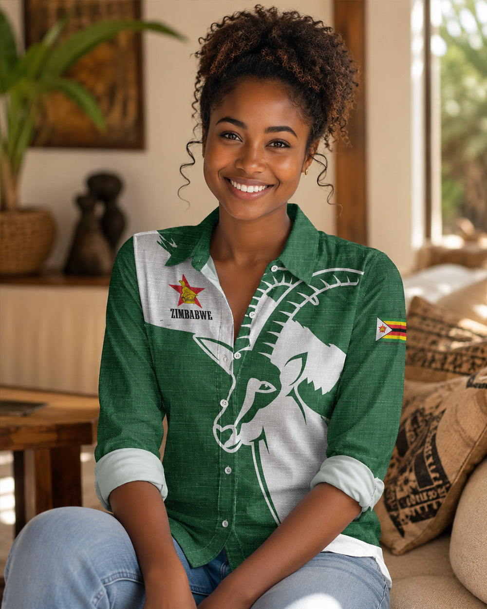 Woman wearing a green and white shirt with a goat design in a home setting