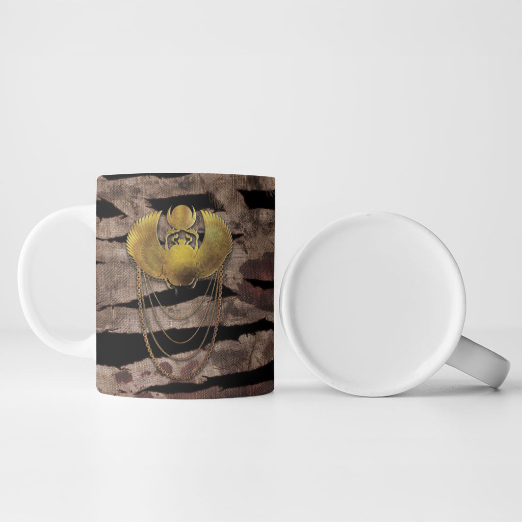 African Halloween Egypt Mummy Wrap Ceramic Mug Golden Winged Scarab Badge