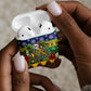 Afro-Vincentian Christmas AirPods Case This Vincy Parrot Needs A Beach Retreat