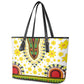 Afro Enkutatash Dashiki and Adey Abeba Leather Tote Bag