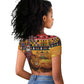 Afro Christmas in Kenya Safari Raglan Cropped T shirt Black Santa Riding Lion - African Pride