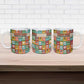 Everyday Genius Powered by Black Minds Ceramic Mug with Colorful Invention Icons Pattern - African Pride