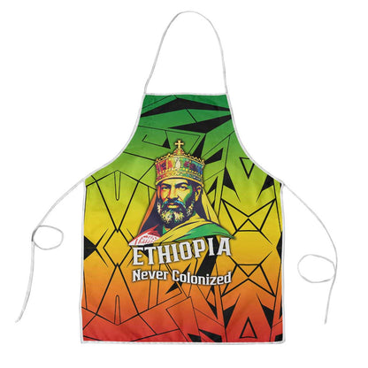 Menelik II Apron with Crowned Portrait, Ethiopia Never Colonized Text and Pan-African Abstract - African Pride