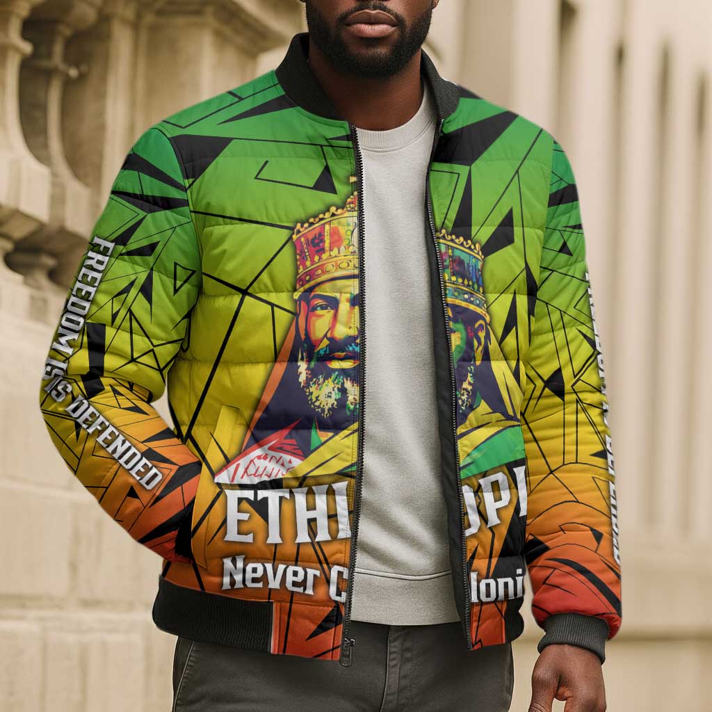 Menelik II Bomber Puffer Jacket with Crowned Portrait, Ethiopia Never Colonized Text and Pan-African Abstract - African Pride