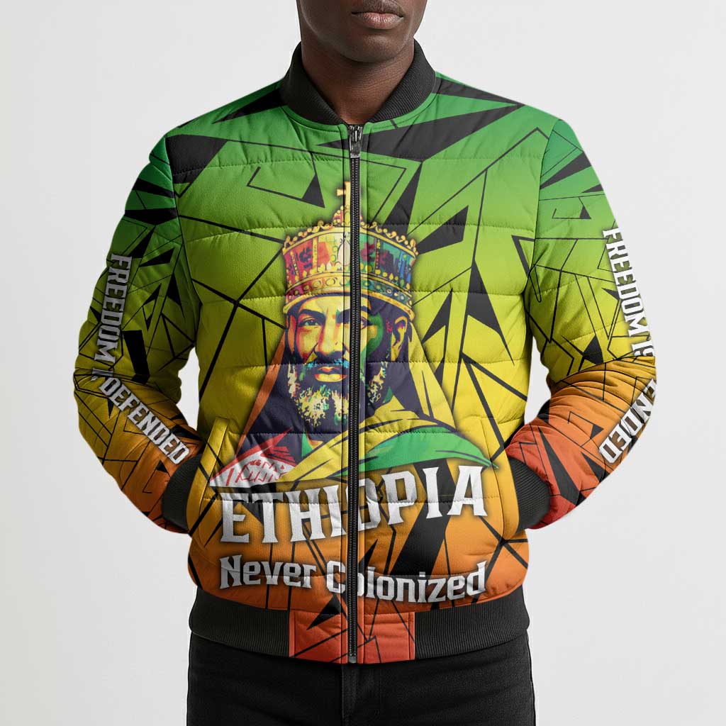 Menelik II Bomber Puffer Jacket with Crowned Portrait, Ethiopia Never Colonized Text and Pan-African Abstract - African Pride