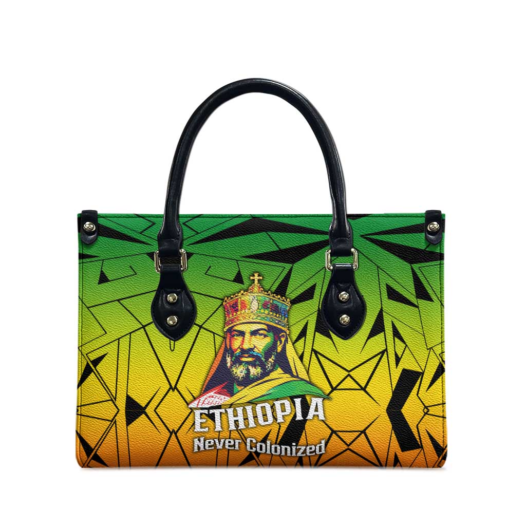 Menelik II Leather Bag with Crowned Portrait, Ethiopia Never Colonized Text and Pan-African Abstract - African Pride