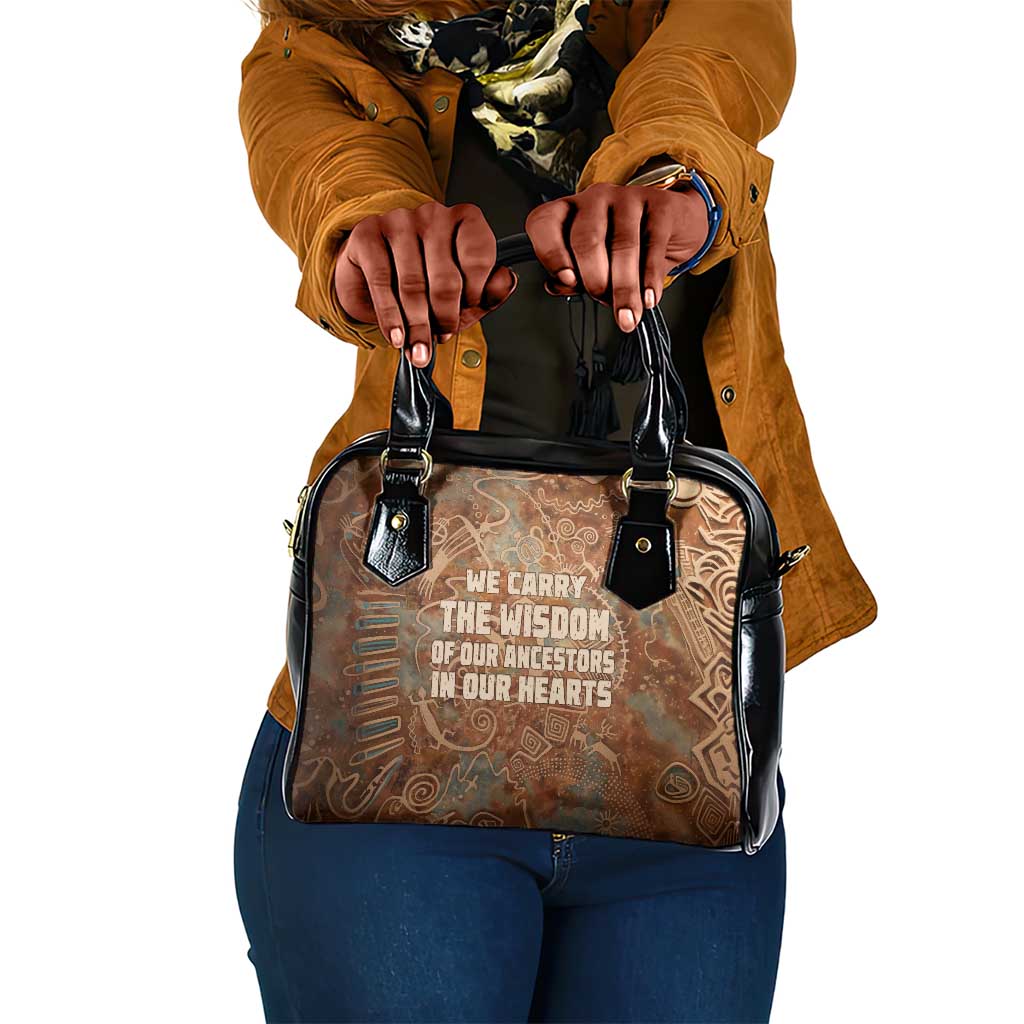 We Carry The Wisdom Shoulder Handbag Indigenous Spirit Quote Art - African Pride