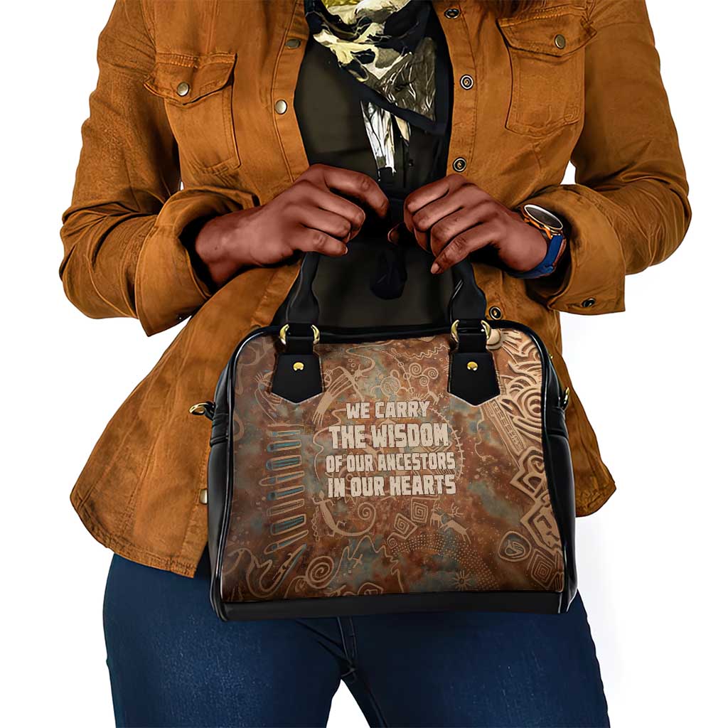 We Carry The Wisdom Shoulder Handbag Indigenous Spirit Quote Art - African Pride