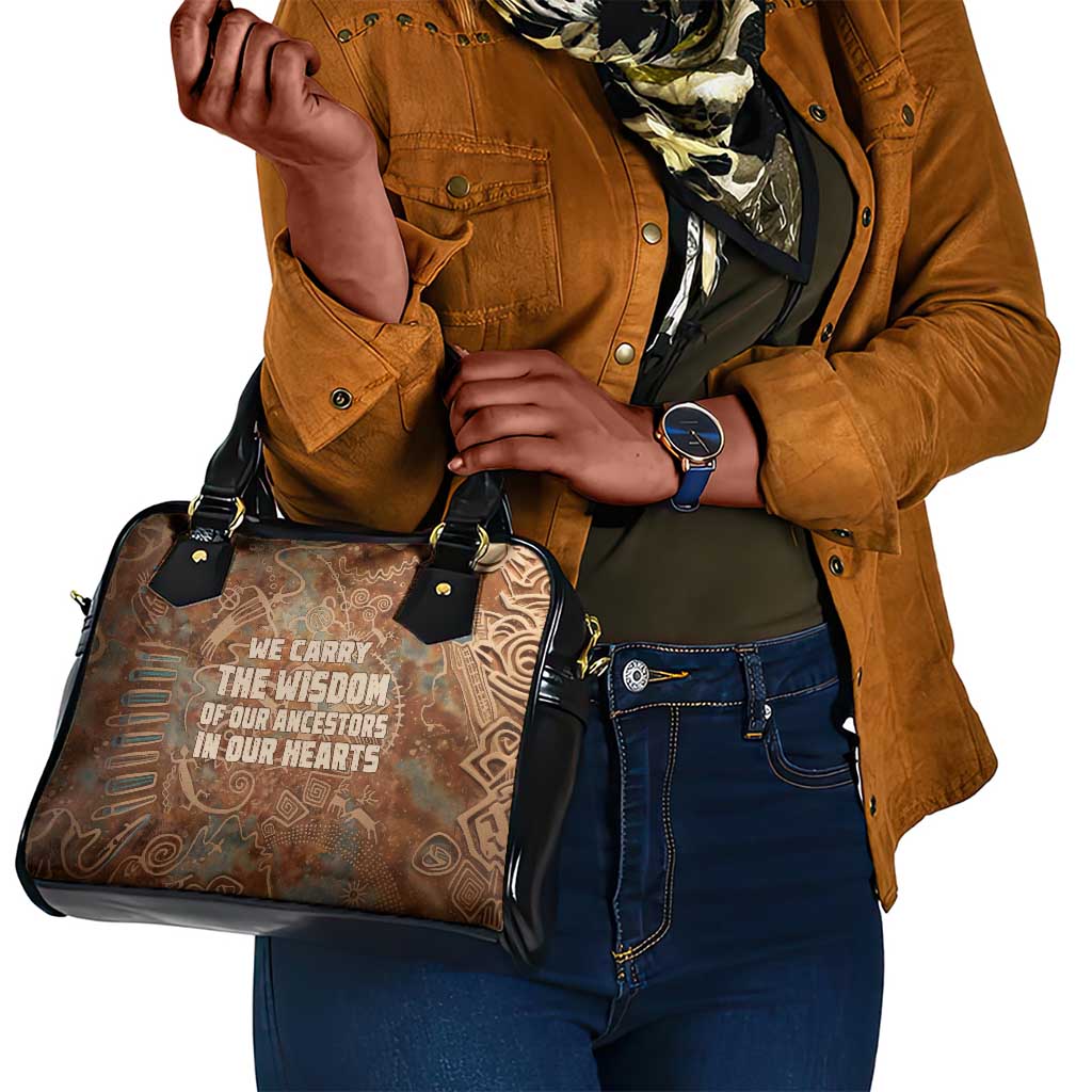 We Carry The Wisdom Shoulder Handbag Indigenous Spirit Quote Art - African Pride