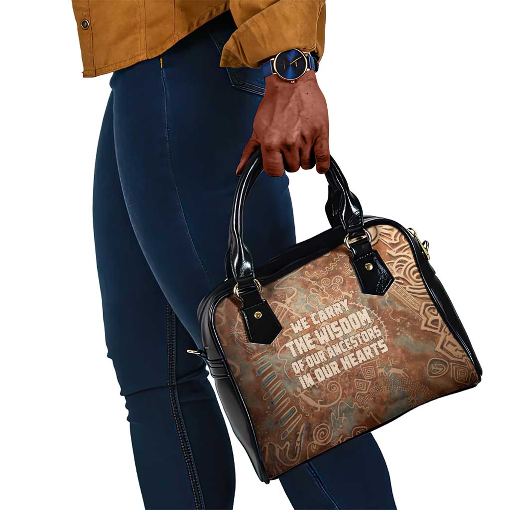 We Carry The Wisdom Shoulder Handbag Indigenous Spirit Quote Art - African Pride