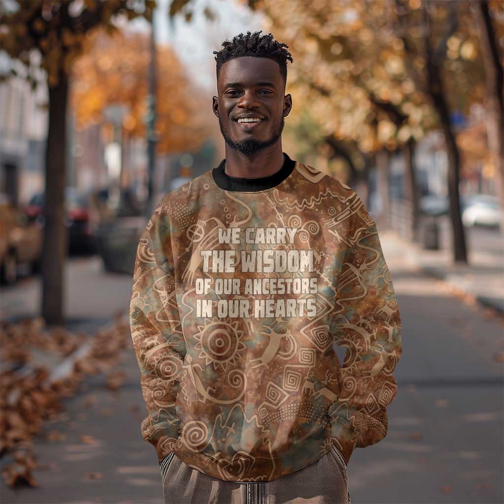 We Carry The Wisdom Sweatshirt Indigenous Spirit Quote Art - African Pride