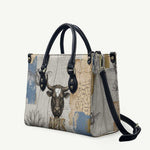 Apis Ancient Egyptian Leather Bag with Beige-Gray Hieroglyphic, Ornate Bull Head, and Gold-Blue Typography - African Pride