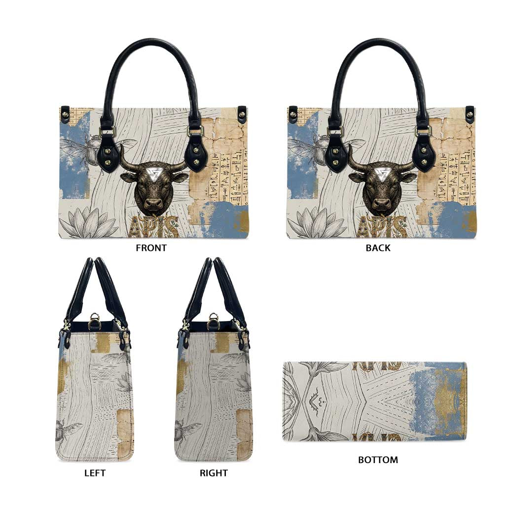 Apis Ancient Egyptian Leather Bag with Beige-Gray Hieroglyphic, Ornate Bull Head, and Gold-Blue Typography - African Pride