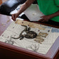 Apis Ancient Egyptian Puzzle with Beige-Gray Hieroglyphic, Ornate Bull Head, and Gold-Blue Typography - African Pride