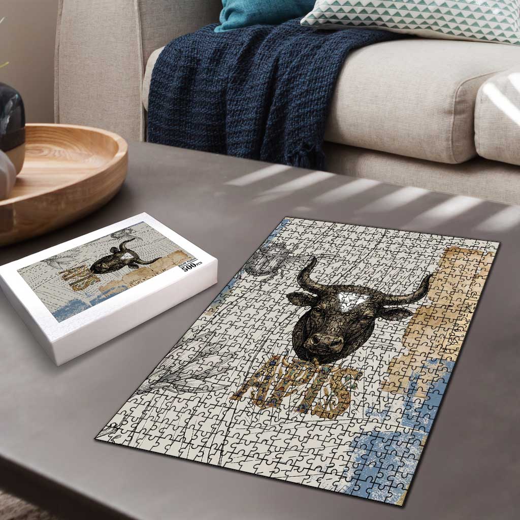 Apis Ancient Egyptian Puzzle with Beige-Gray Hieroglyphic, Ornate Bull Head, and Gold-Blue Typography - African Pride