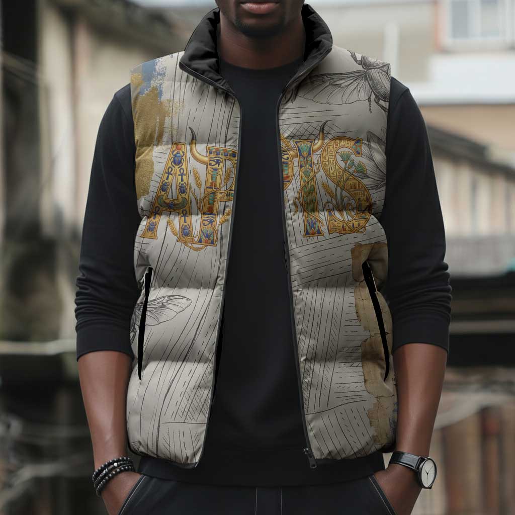 Apis Ancient Egyptian Sleeveless Puffer Jacket with Beige-Gray Hieroglyphic, Ornate Bull Head, and Gold-Blue Typography - African Pride