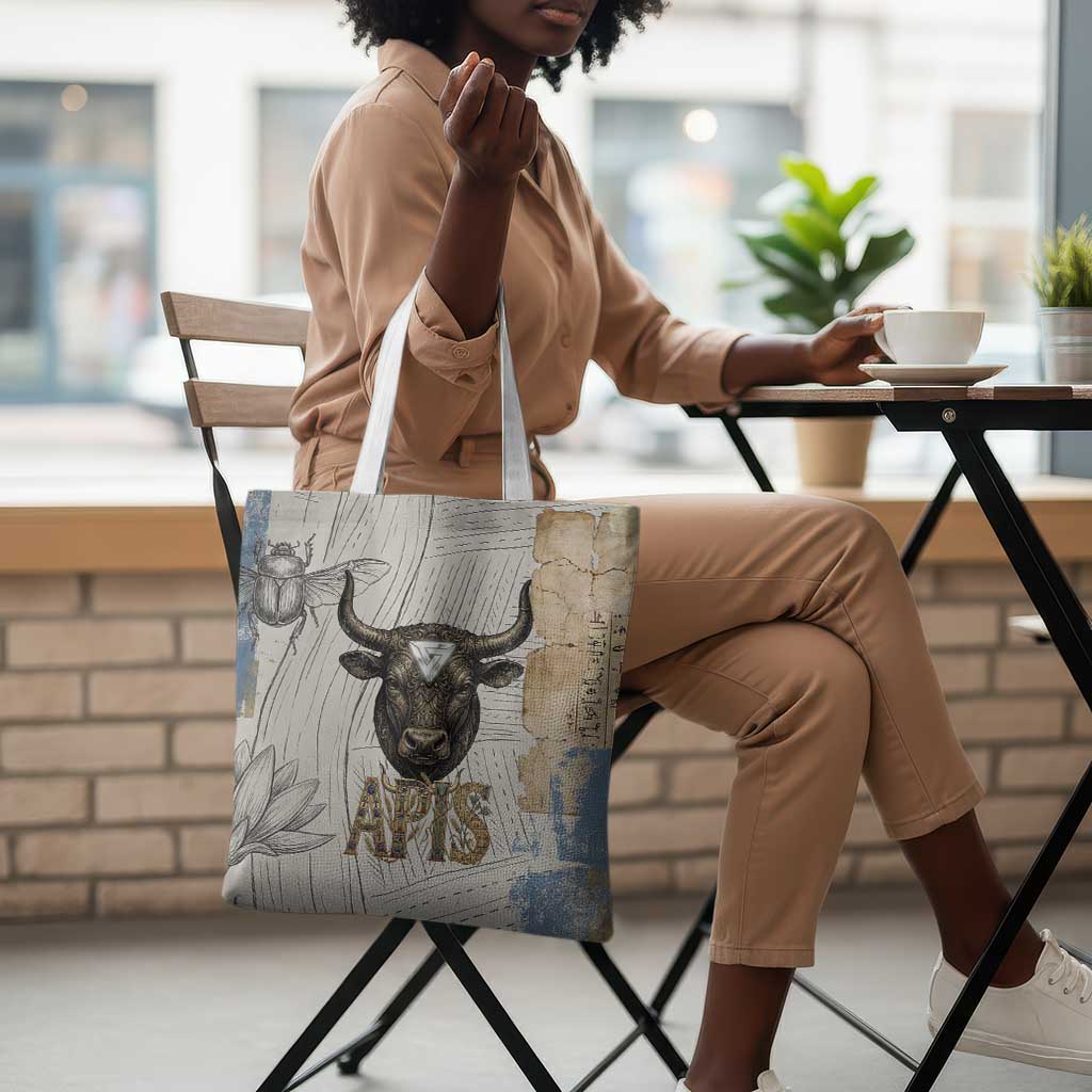 Apis Ancient Egyptian Tote Bag with Beige-Gray Hieroglyphic, Ornate Bull Head, and Gold-Blue Typography - African Pride